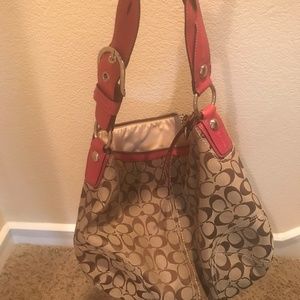 Tan and pink coach hobo